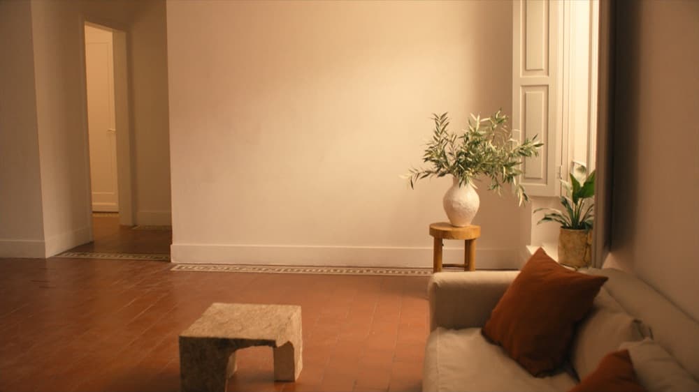 The living room of Casa Olivar, a sunlit Lisbon apartment